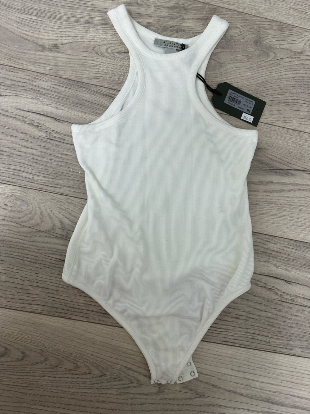 AllSaints white bodysuit racer back 
New with tags never worn 
Size 2